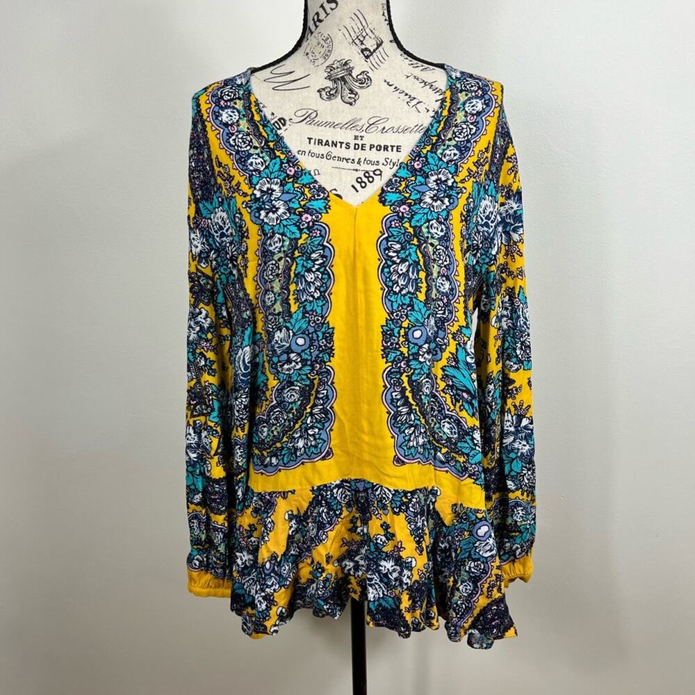 Free people yellow blue and white patterned long sleeve peplum hem blouse